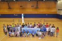 Group photo at the Third Director’s Cup Badminton Tournament